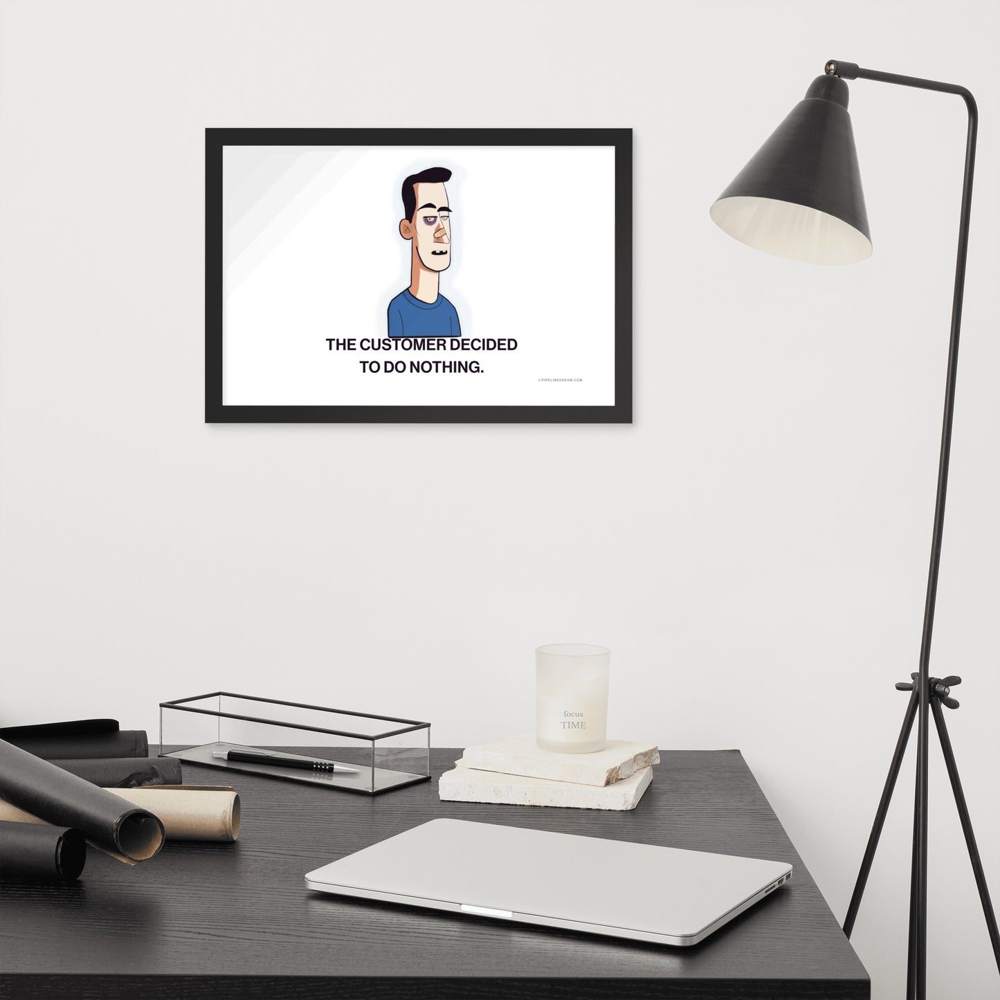 Sales humor poster displayed in a modern office workspace.