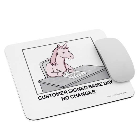 Angled view of a sales humor mouse pad illustrating the rare moment of same-day approval with no contract changes — Pipeline Dream