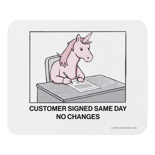Sales humor mouse pad featuring a unicorn signing a contract with the caption “Customer signed same day no changes” — Pipeline Dream