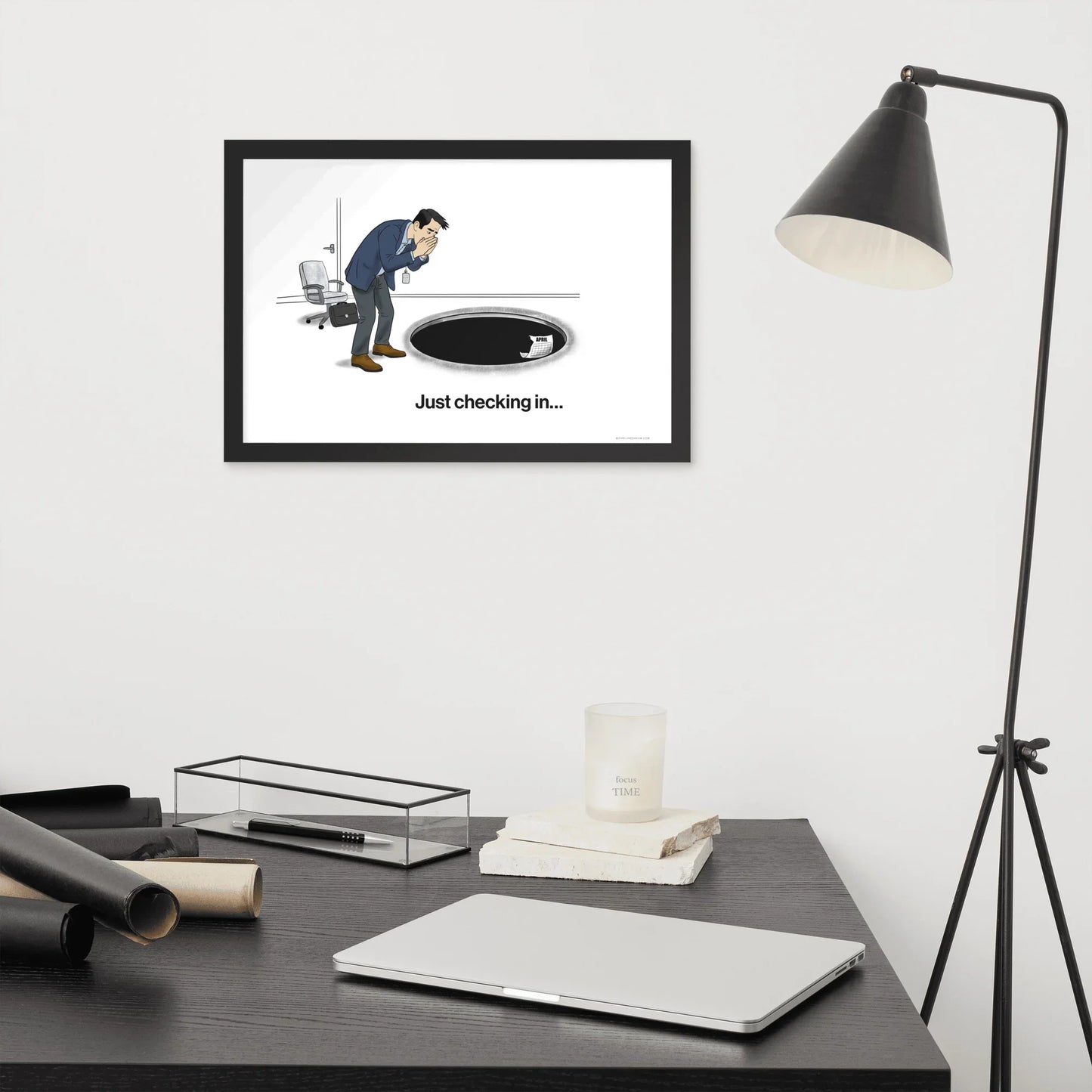 funny office wall art sales poster above desk with lamp and workspace