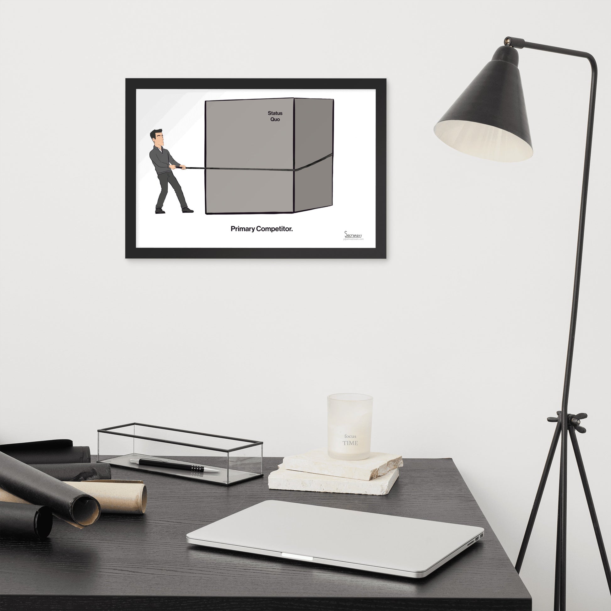Primary Competitor sales poster displayed in a modern home office workspace